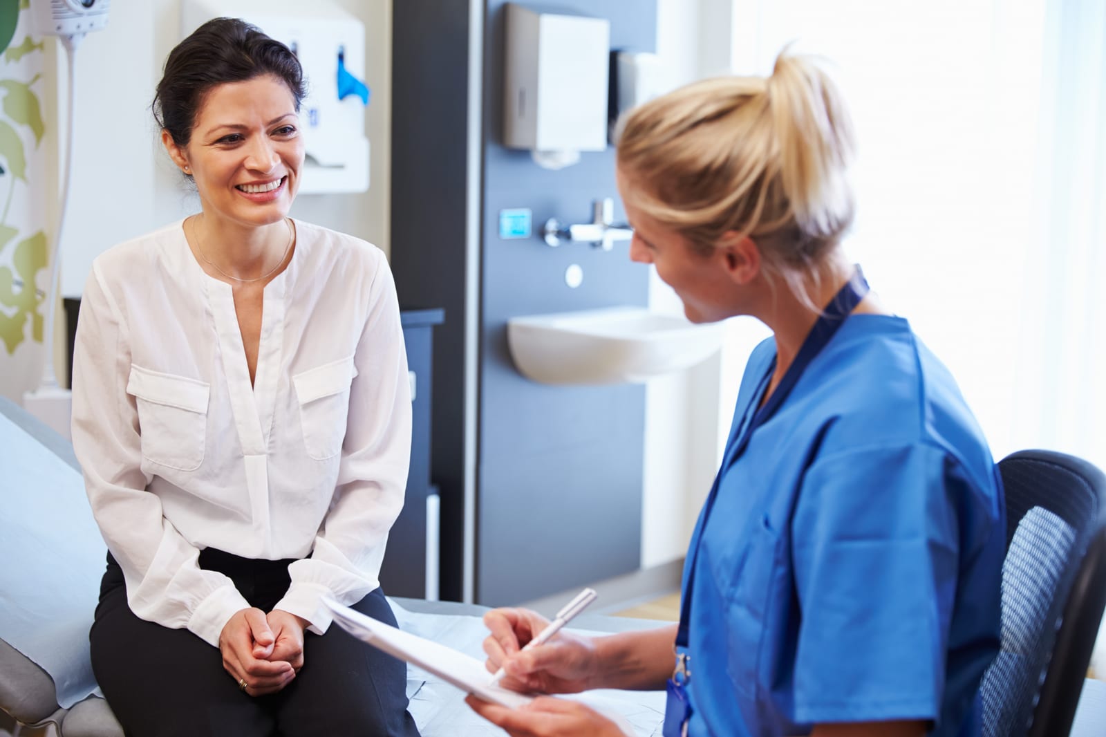 FemiLift | A woman having a medical consultation