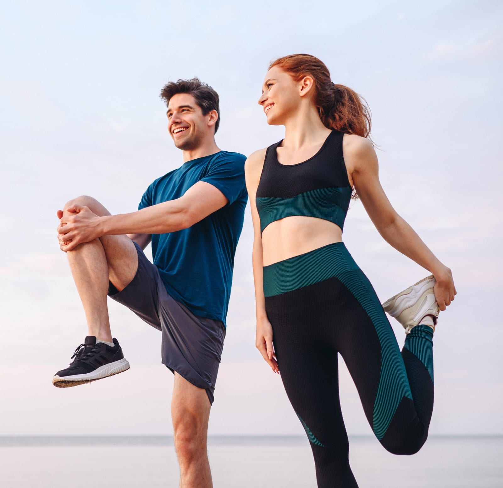 Exilis Treatment | A couple stretching before exercise