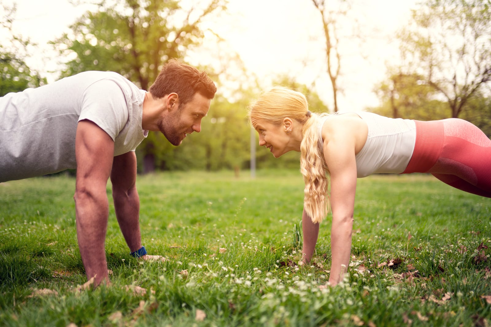 Exilis Treatment | A fit couple exercising together outside