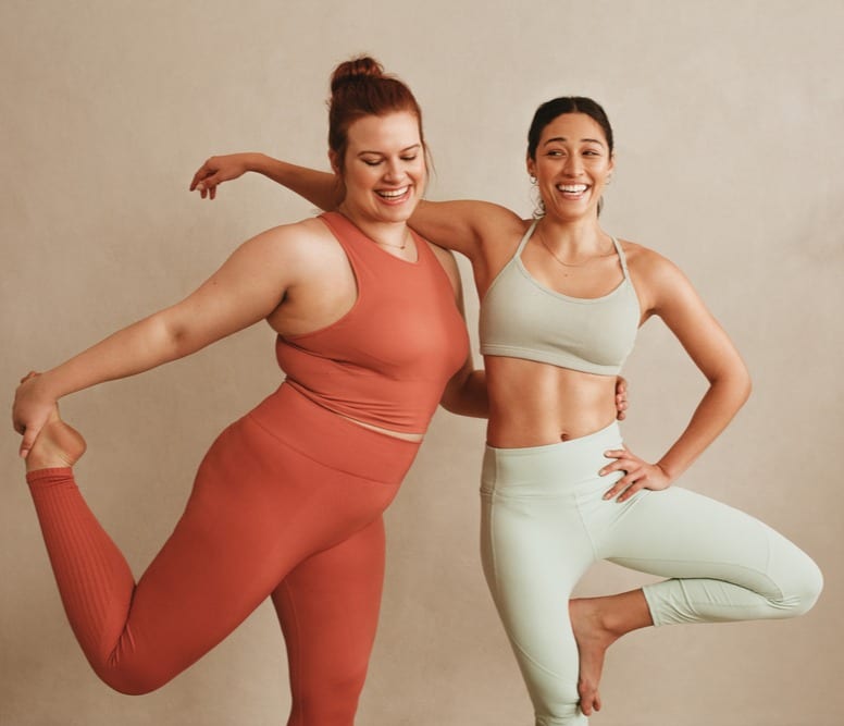 Laser Vaginal Rejuvenation | 2 women exercising together in a yoga pose