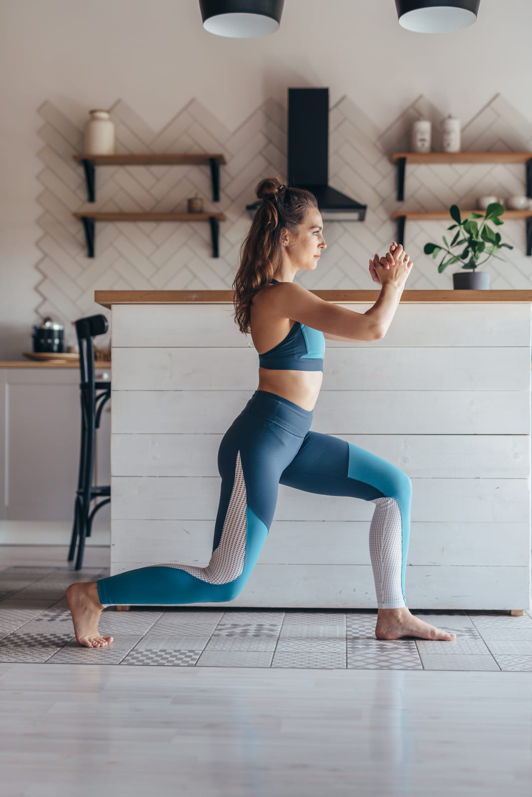 Cellulite | A young woman exercising indoors